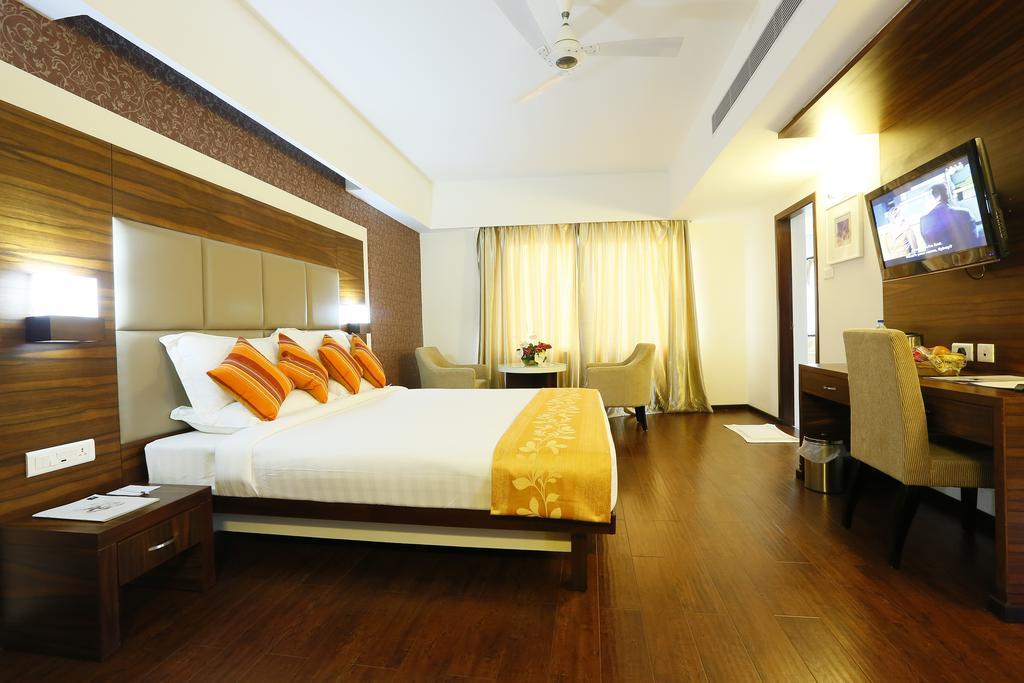 Hotel Moonlit Regency Thodupuzha Phòng bức ảnh