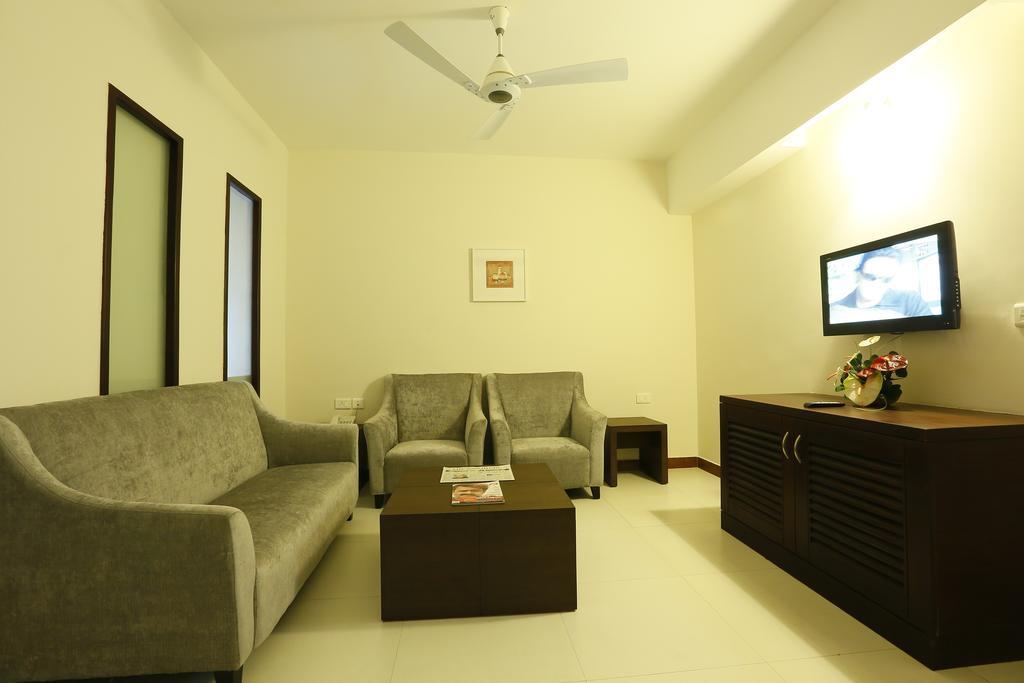 Hotel Moonlit Regency Thodupuzha Phòng bức ảnh