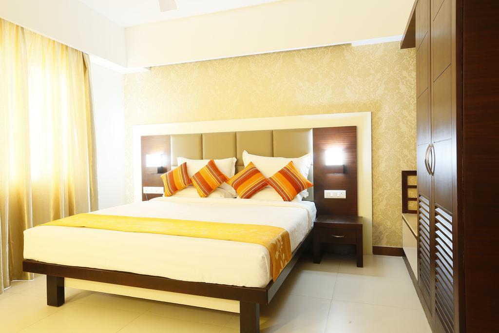 Hotel Moonlit Regency Thodupuzha Phòng bức ảnh