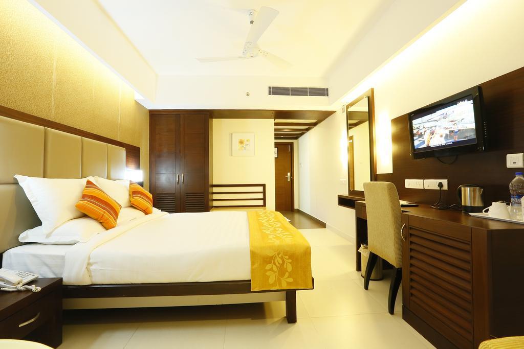 Hotel Moonlit Regency Thodupuzha Phòng bức ảnh